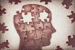 Símbolo de la psicología en forma de una cabeza como puzzle